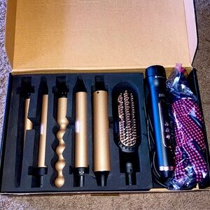 New never used 6 in 1 Curling Iron Wand Set